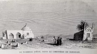 The image depicts a grave site, specifically the Tomb of Eve, in the cemetery of Djeddah (Jeddah). It shows a domed structure that likely marks the tomb, surrounded by a barren landscape. In the foreground, a small group of people is gathered, dressed in traditional attire. The scene is set against a backdrop that suggests a historical or cultural significance, with additional structures or ruins visible in the distance. The overall atmosphere conveys a sense of reverence and history.