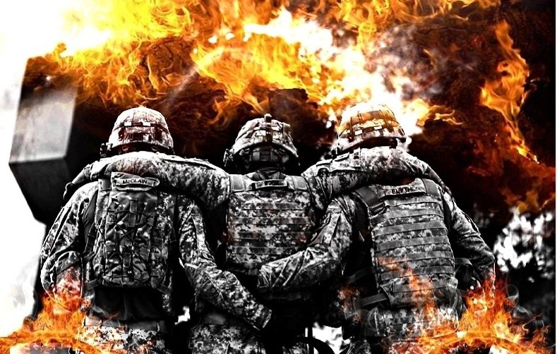 L'image montre trois soldats se tenant ensemble, leurs bras autour des épaules des autres, dans un environnement chaotique. En arrière-plan, on voit des flammes et des débris, ce qui évoque une scène de guerre ou de combat intense. Les soldats portent des uniformes militaires, et l'atmosphère générale de l'image est sombre et dramatique, soulignant la camaraderie et le courage face au danger. Les effets de feu ajoutent une intensité visuelle et émotionnelle à la scène.