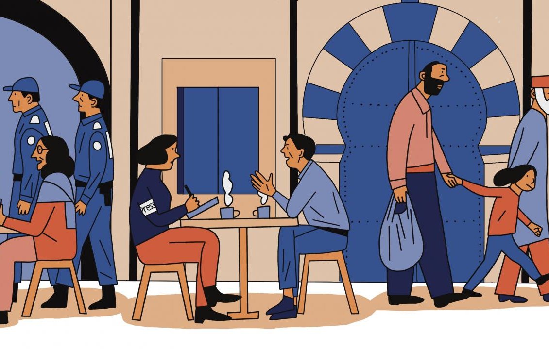 The image depicts a lively street scene with various people engaged in different activities. On the left, two individuals are sitting at tables, having drinks or food, appearing relaxed and engaged in conversation. In the background, there are two police officers walking, suggesting a sense of security in the area. A family is seen on the right side, consisting of an adult holding a child's hand, while another person carries a bag. The colors are predominantly blue and beige, creating a warm and inviting atmosphere. Overall, the scene portrays a blend of social interaction and community presence.