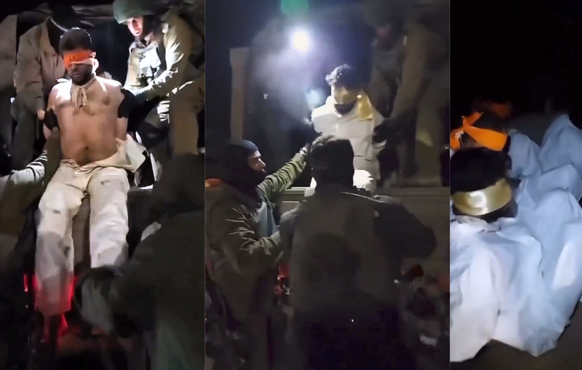 L'image montre plusieurs personnes en train d'être aidées ou manipulées par des individus en tenue militaire. Les personnes au sol semblent être enveloppées dans des vêtements clairs, certaines portant des bandeaux sur les yeux. L'éclairage provient d'une source intense, ce qui crée des ombres marquées et une atmosphère tendue. On peut distinguer des mouvements rapides et une certaine agitation dans la scène.