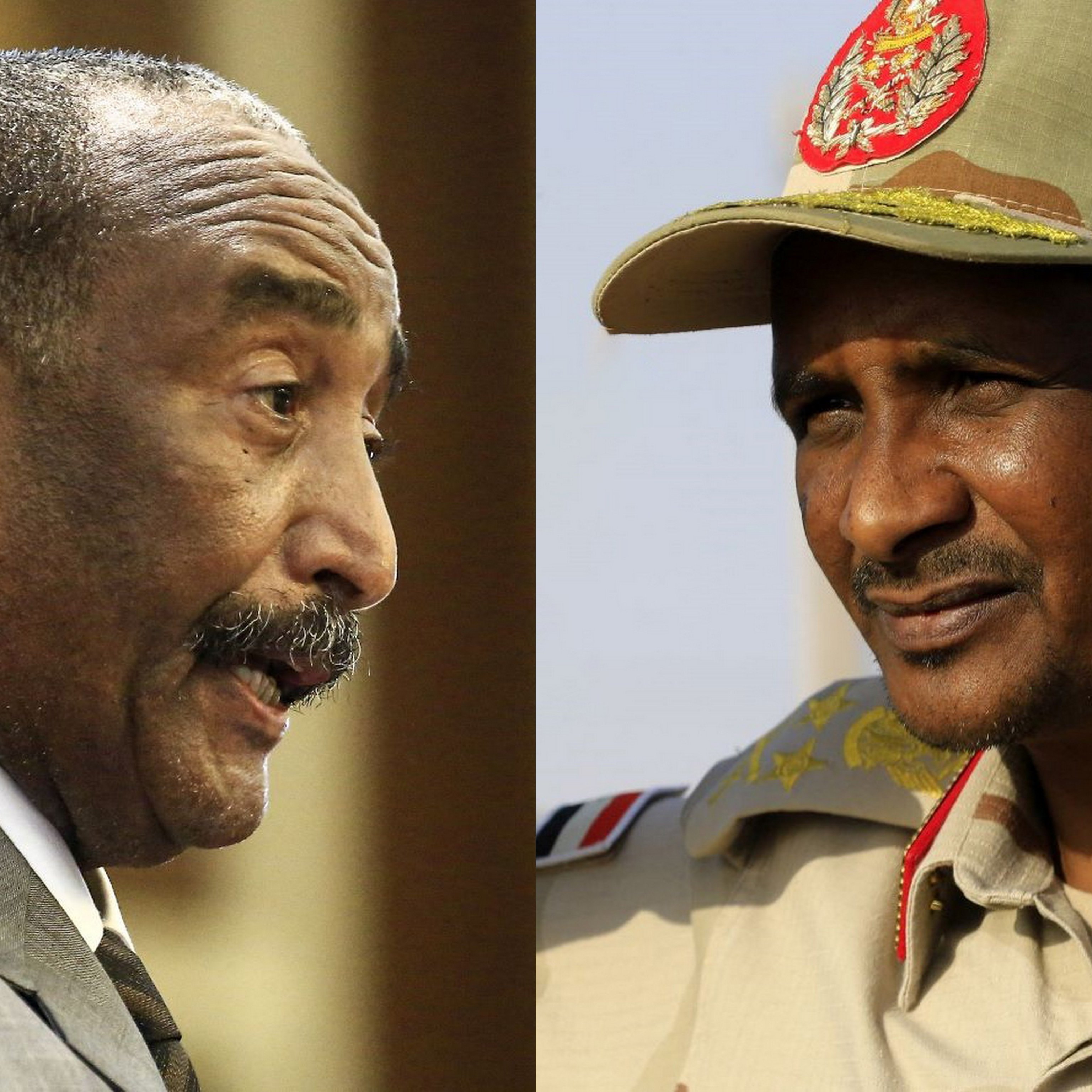 L'immagine mostra due uomini in uniformi militari e abiti formali. A sinistra, uno di loro parla con un'espressione seria, probabilmente in un contesto di conferenza o incontro ufficiale. A destra, l'altro uomo è vestito con una divisa da generale e ha un'aria decisa, con il cappello ben impostato sulla testa. Lo sfondo è semplice e mette in risalto i soggetti, suggerendo un contesto di leadership o autorità.