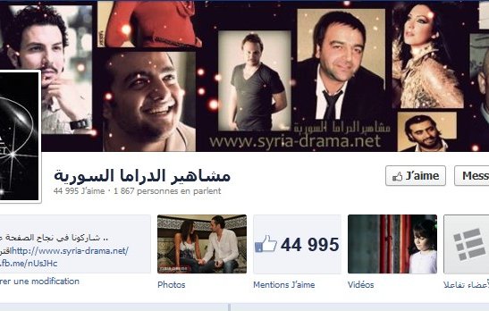 L'image semble représenter une page Facebook consacrée à des célébrités ou des acteurs syriens. Elle inclut des photos d'individus, probablement des artistes, ainsi qu'un logo pour « Syria Drama ». En bas de l'image, on voit le nombre de « J'aime » de la page, qui est de 44 995, ainsi que le nombre de personnes interagissant avec la page. L'ensemble donne une impression de promotion et de célébration de la culture dramatique syrienne.