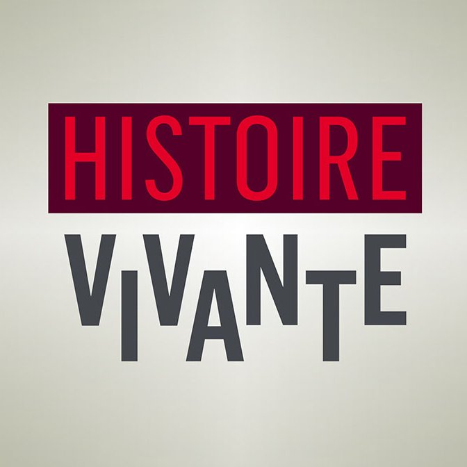L'image présente un fond clair avec le texte "HISTOIRE VIVANTE" en deux couleurs. Le mot "HISTOIRE" est écrit en rouge, en lettres majuscules, tandis que "VIVANTE" est en gris, avec un style de police plus audacieux et légèrement décalé. L'ensemble donne une impression dynamique et moderne.