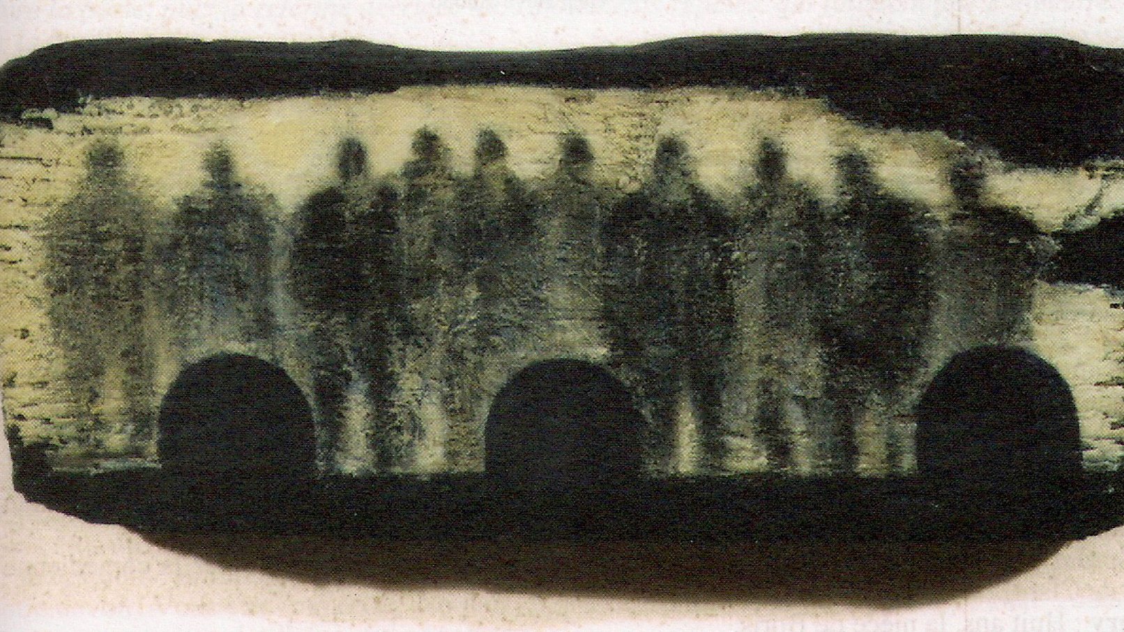 The image depicts a dark stone or slab with a textured surface. On the stone, there are lighter silhouettes that resemble human figures, arranged in a line. The figures appear shadowy and lack distinct features, creating an enigmatic and ghostly effect. Below the silhouettes, there are two arch-like shapes that could represent openings or doorways, adding depth to the composition. Overall, the piece evokes a sense of mystery and abstraction.