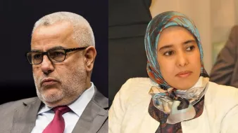 The image features two individuals side by side. On the left, a man is depicted wearing glasses and a gray suit with a red tie. He appears serious and is looking directly ahead. On the right, a woman is shown wearing a hijab and a white jacket. She is also looking forward, maintaining a composed expression. The background is neutral, focusing on the two figures.