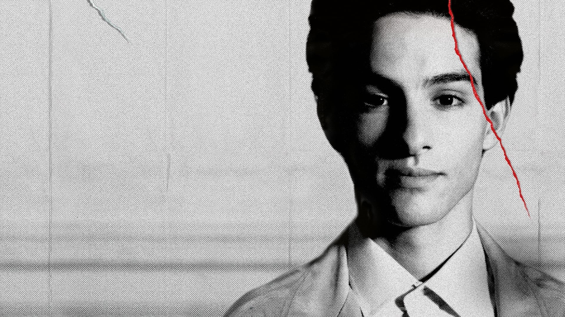 L'image présente un portrait en noir et blanc d'un jeune homme. Son expression est sérieuse et il a les yeux fixés vers l'avant. On peut voir des détails de son visage qui ressortent bien grâce à l'éclairage. Le fond est flou, ce qui met davantage en valeur sa silhouette. Il semble également y avoir un effet de texture sur l'image, ajoutant une dimension artistique.