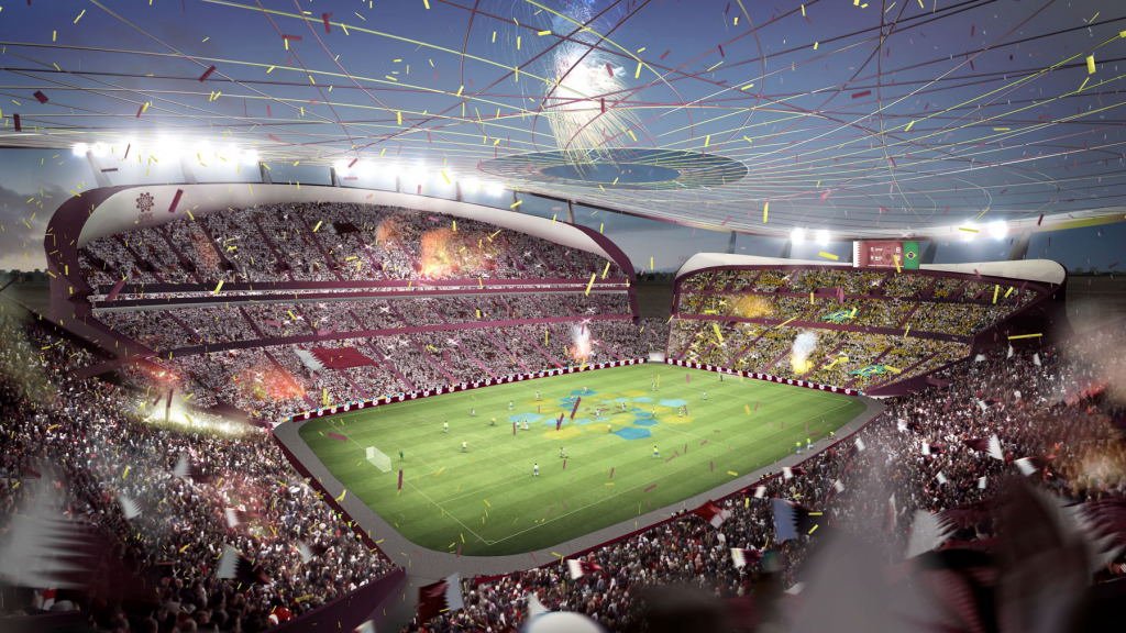 L'image représente un grand stade de football rempli de spectateurs enthousiastes. On peut voir des tribunes pleines, avec des fans agitant des drapeaux et des confettis qui tombent du ciel. Le terrain est bien verdoyant, et on aperçoit des joueurs au centre, en pleine action. Le ciel semble chargé de couleurs vives et de lumières, créant une ambiance festive et dynamique. L'ensemble de la scène évoque une atmosphère de célébration et d'excitation sportive.