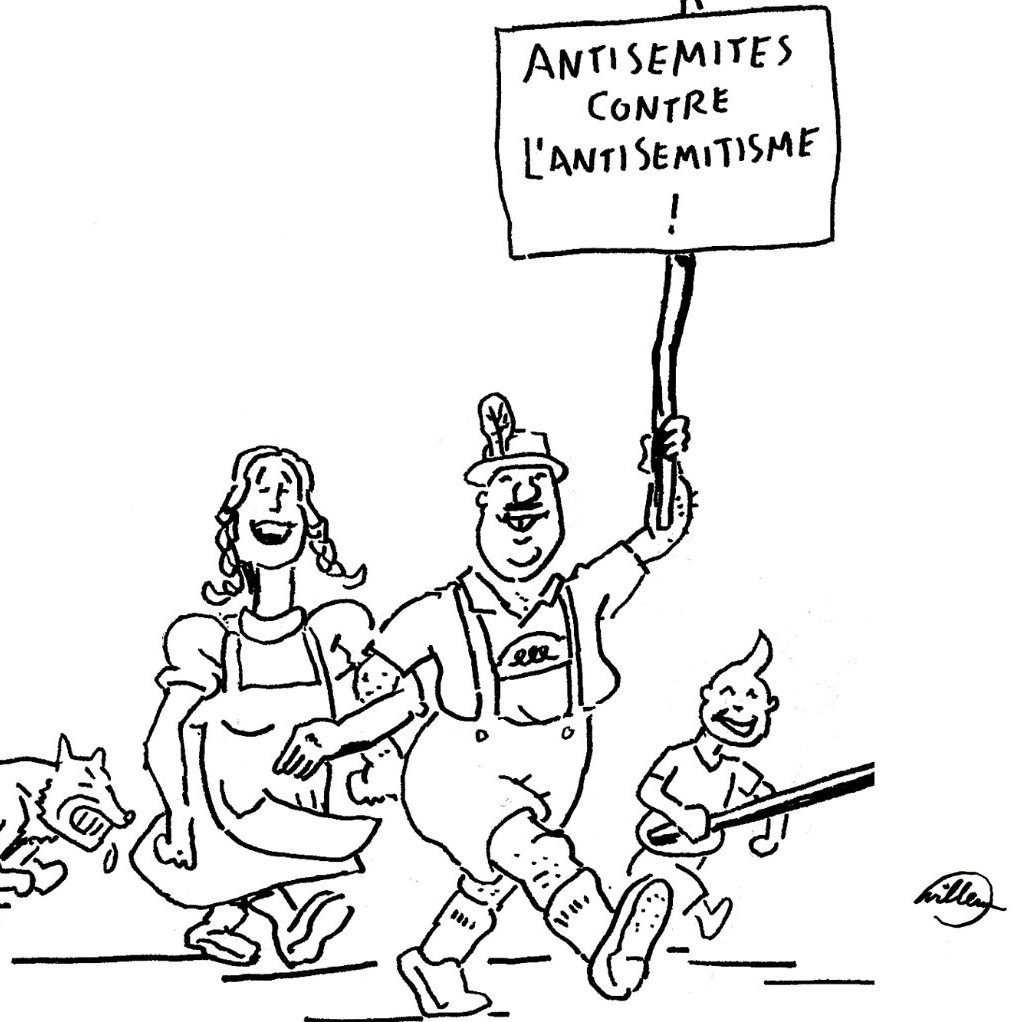 Deux personnes et un chien manifestent avec un panneau "Antisémites contre l'antisémitisme".