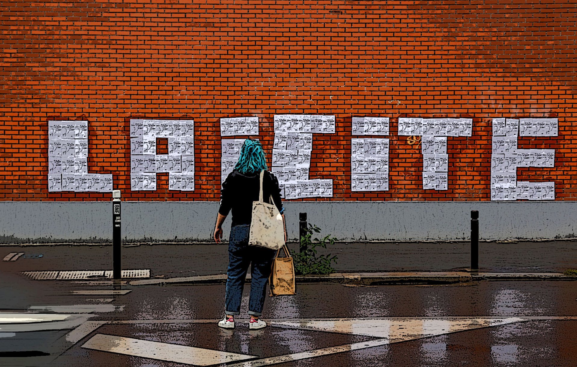 The image shows a person standing in front of a brick wall on which the word "LAICITE" is prominently displayed in large, white, block letters. The individual appears to be wearing a turquoise headscarf and carries a bag, facing the wall. The ground is wet, suggesting it may have recently rained, and the scene includes elements indicating a city environment, such as street signs and a road marking in the foreground. The overall atmosphere combines urban art with a mood of contemplation or engagement with the word on the wall.