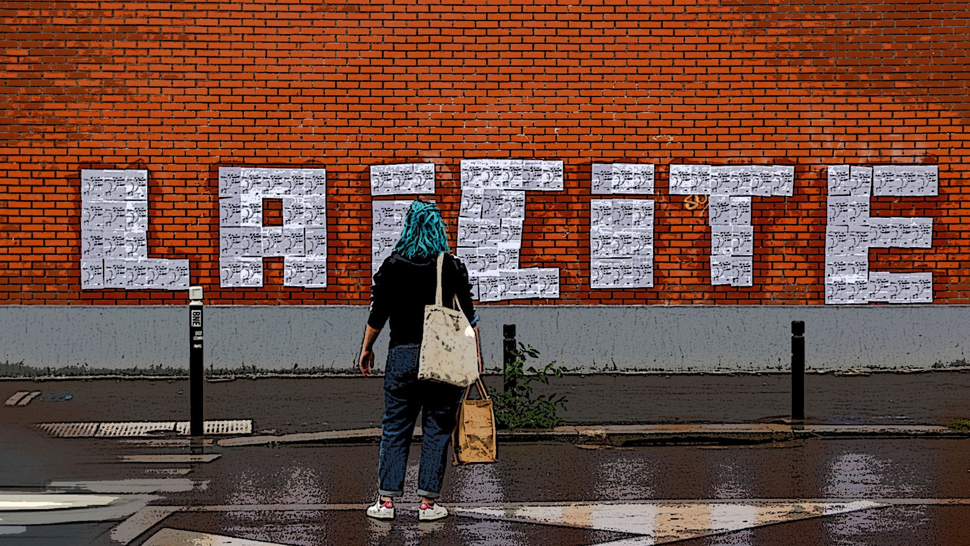 The image shows a person standing in front of a brick wall on which the word "LAICITE" is prominently displayed in large, white, block letters. The individual appears to be wearing a turquoise headscarf and carries a bag, facing the wall. The ground is wet, suggesting it may have recently rained, and the scene includes elements indicating a city environment, such as street signs and a road marking in the foreground. The overall atmosphere combines urban art with a mood of contemplation or engagement with the word on the wall.