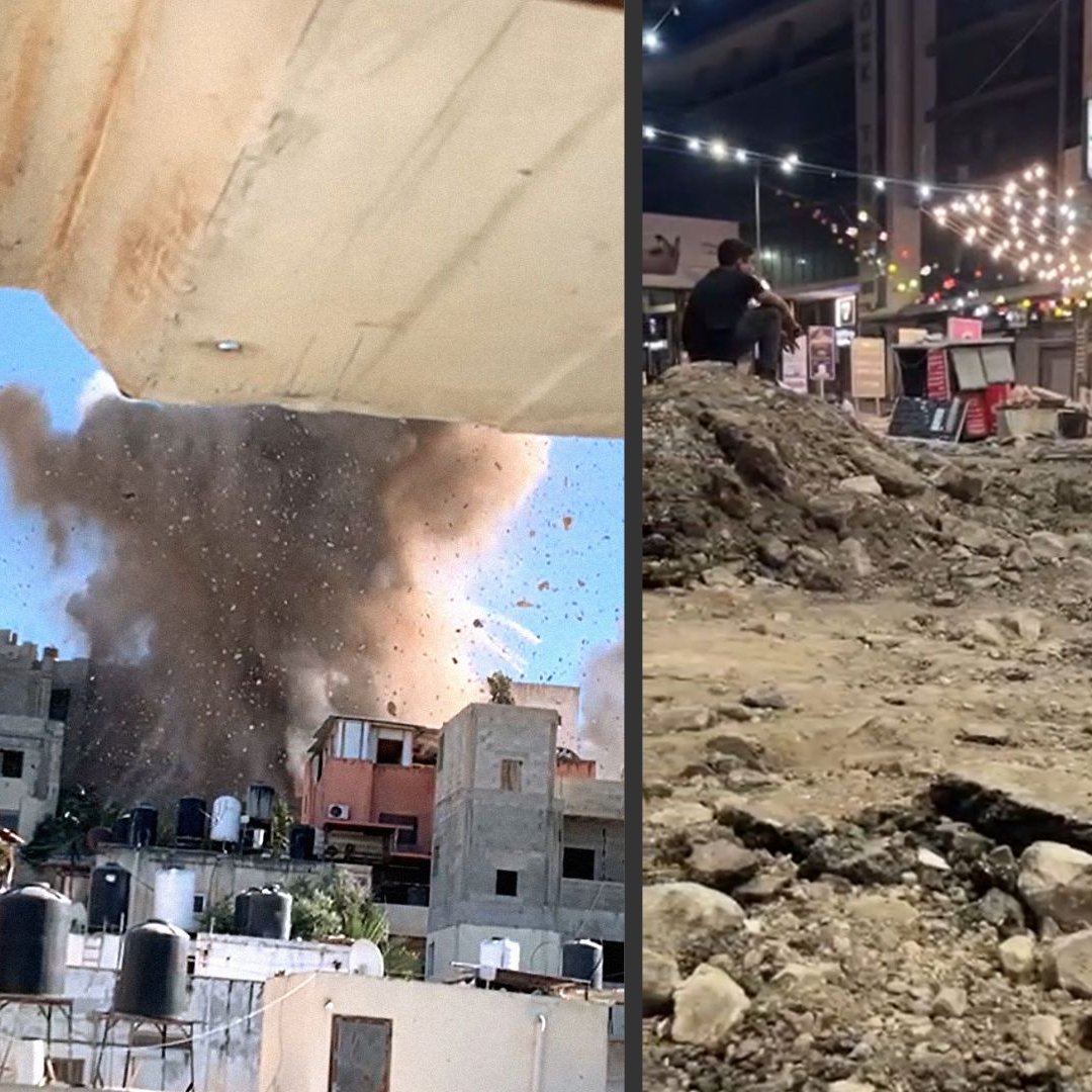 L'immagine presenta due scene contrastanti. A sinistra, si vede un'esplosione che solleva una grande nube di fumi e detriti nel cielo, con edifici danneggiati intorno. Questa scena trasmette un senso di caos e distruzione. A destra, c'è una vista di un'area di costruzione con terreno smosso e rocce sparse, evidenziando lavori in corso e un'atmosfera di disordine, ma senza la violenza dell'esplosione a sinistra. La luce soffusa delle luci decorative suggerisce una possibile area urbana.