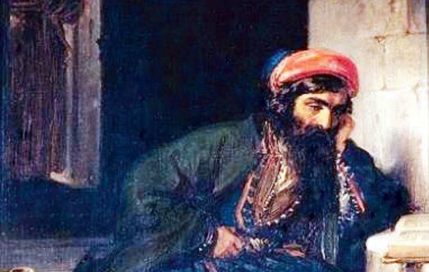 L'image représente un homme assis sur le sol, avec une barbe fournie et portant des vêtements traditionnels. Il a l'air pensif et semble écouter quelque chose, peut-être avec une expression de mélancolie. À l'arrière-plan, on aperçoit une autre personne, probablement un personnage de l'histoire, observant la scène. Un pot en terre cuite est visible à côté de l'homme, ajoutant une touche d'authenticité à l'environnement. Les couleurs sont riches et profondes, créant une atmosphère dramatique.