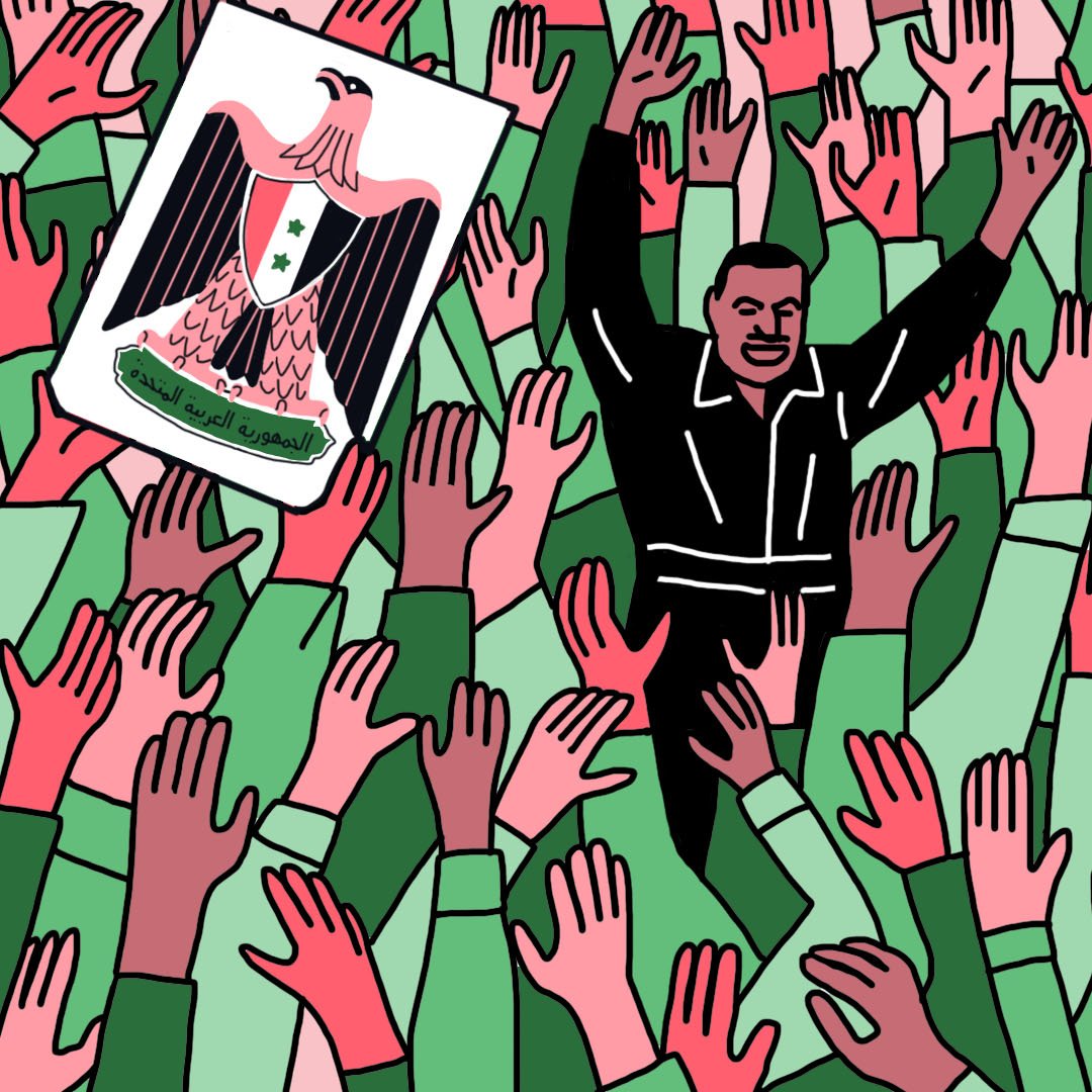 این تصویر جمعیتی بزرگ را نشان می‌دهد که در حال دست زدن و ابراز هیجان هستند. در مرکز تصویر، فردی با لباس سیاه که به نظر می‌رسد در حال سخنرانی است، دیده می‌شود. او دست‌هایش را بالا برده و به جمعیت پاسخ می‌دهد. همچنین، پرچم یا علامت حاکمیتی با نمادِ عقاب در سمت چپ تصویر وجود دارد. رنگ‌های تصویر عموماً سبز و قرمز هستند و حال و هوای شور و هیجان را منتقل می‌کند.