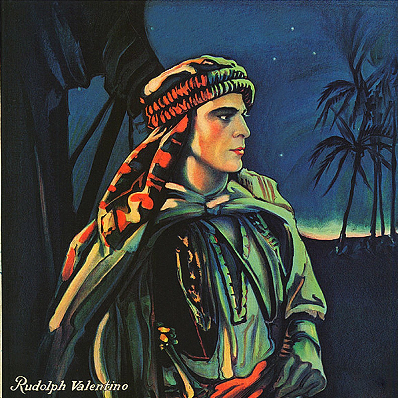 L'image représente une illustration d'un homme, probablement un personnage historique ou un acteur, vêtu d'un costume traditionnel qui semble faire référence à une époque ou une culture spécifique. Il porte une coiffe élaborée et son expression est pensive, regardant vers l'horizon. En arrière-plan, on aperçoit des palmiers et un ciel étoilé, ce qui crée une ambiance nocturne. Le nom "Rudolph Valentino" est inscrit en bas, indiquant qu'il pourrait s'agir de cet acteur emblématique. Les couleurs sont riches et vivent, contribuant à l'atmosphère mélancolique et dramatique de l'image.