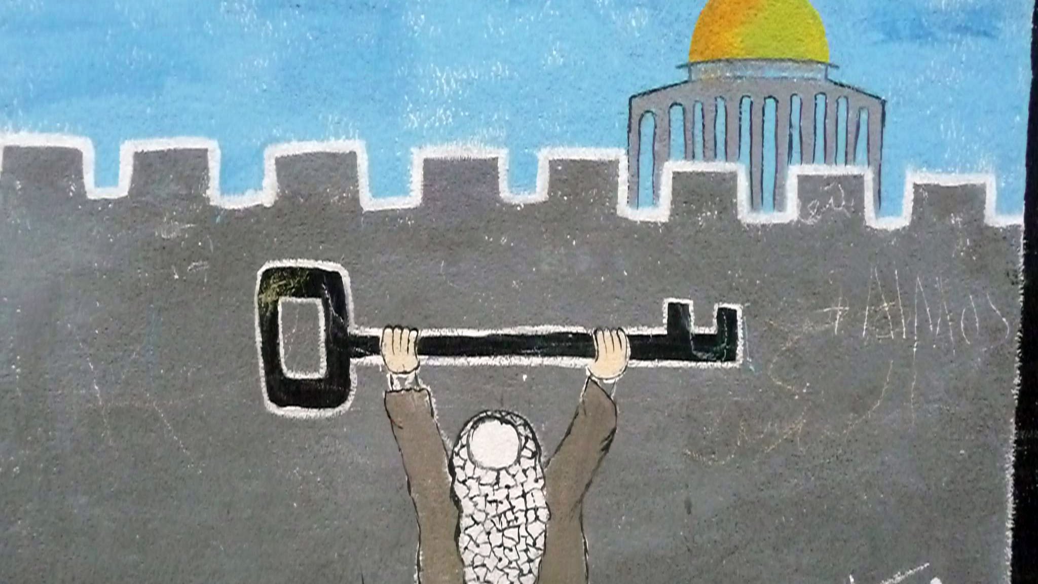 The image depicts a figure holding up a large key above their head, symbolizing hope or the right of return, set against a backdrop of a wall. In the distance, a dome topped building can be seen, likely representing a significant location. The overall tone suggests themes of struggle and aspiration related to identity and heritage.