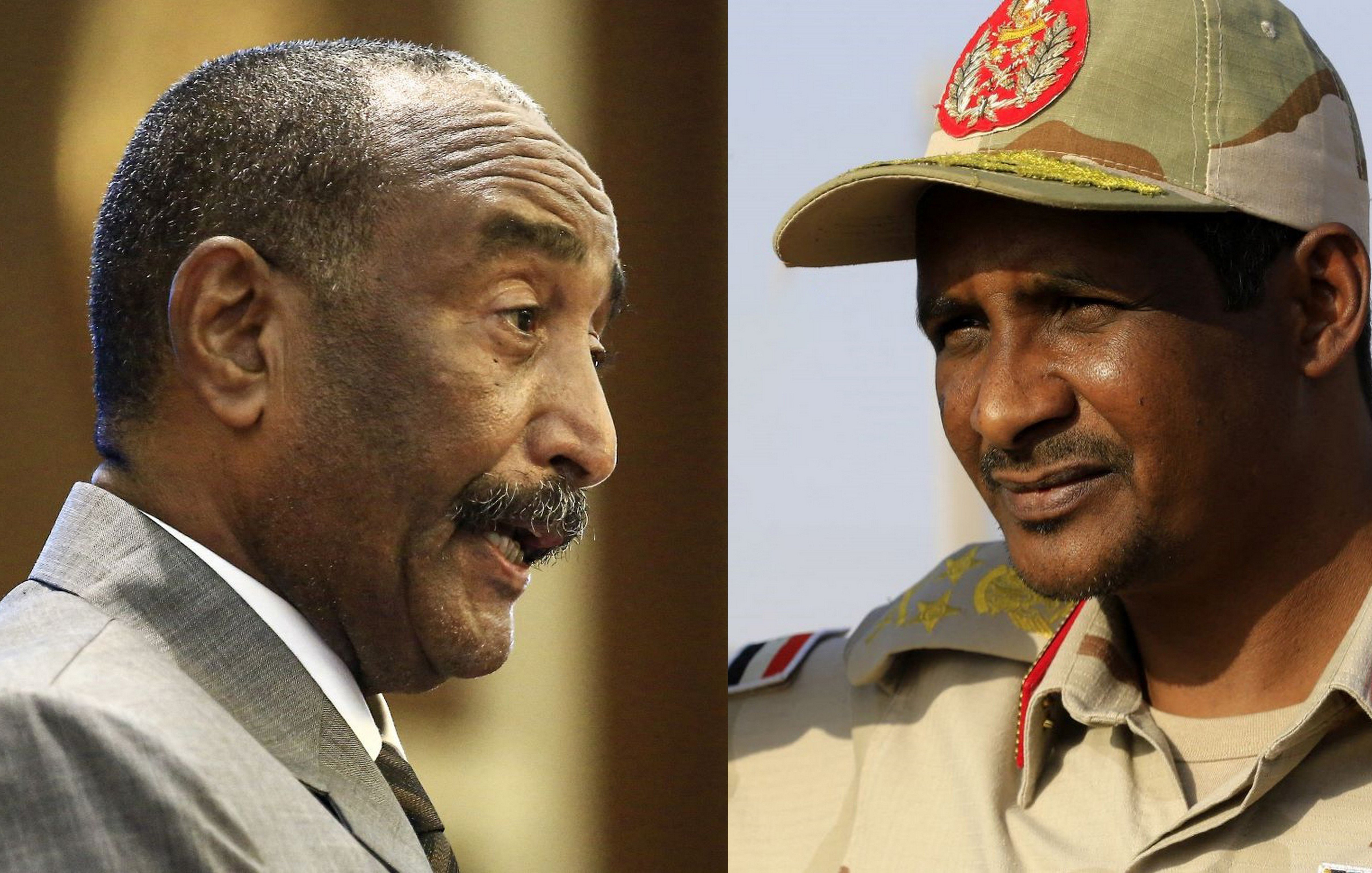 این تصویر دو مرد را نشان می‌دهد که در دو سمت مختلف قرار دارند. یکی از آنها در لباس رسمی و دیگری در لباس نظامی با نشان‌های نظامی بر روی کلاه خود است. هر دو به نظر می‌رسند در حال گفتگو یا بیان نظری هستند و توجهات زیادی را جلب کرده‌اند. زمینه تصویر آبی و طبیعی به نظر می‌رسد.