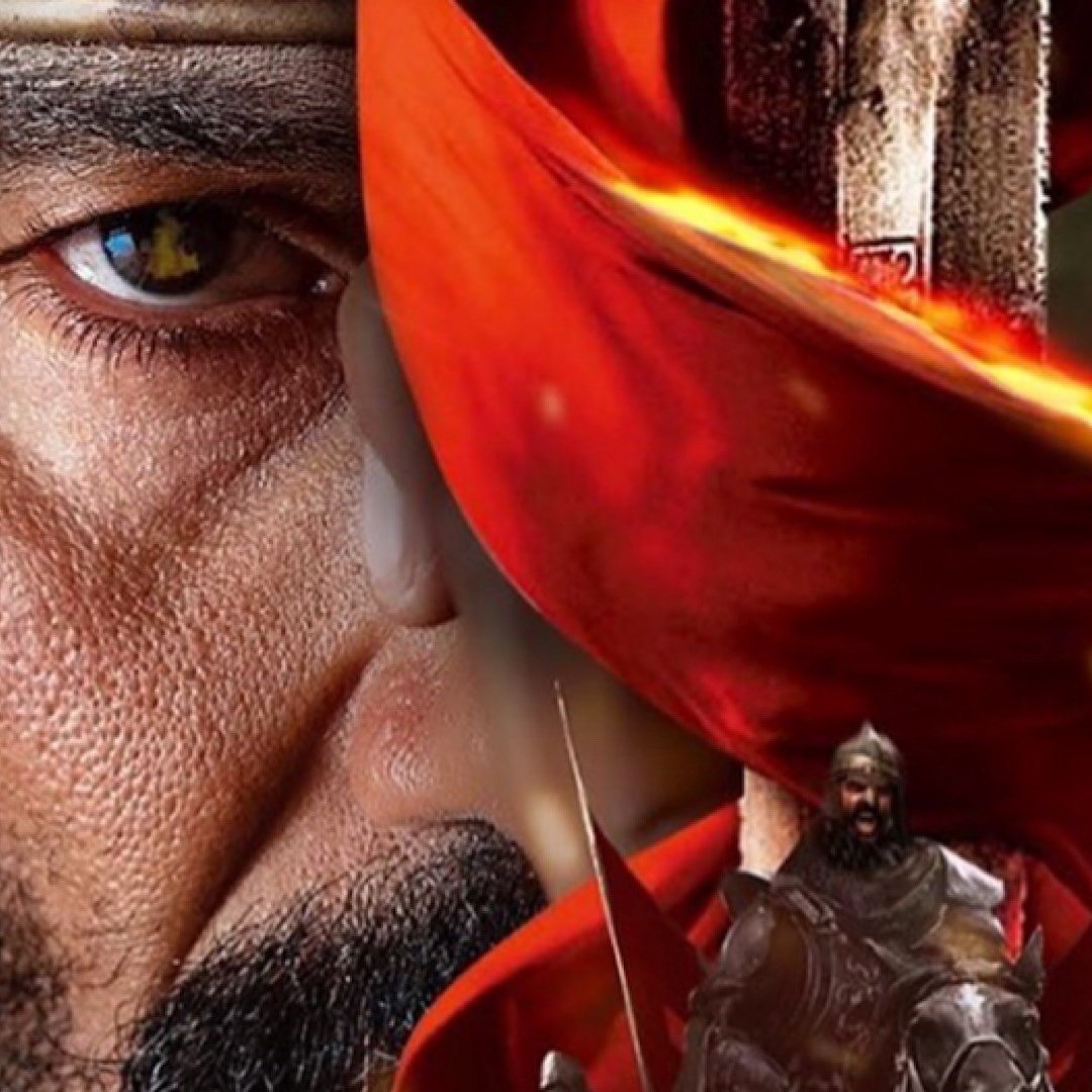 L'image présente une scène intense et dramatique. On peut voir un homme avec un regard déterminé, probablement un guerrier ou un chef militaire. Il est entouré de teintes rouges vives qui suggèrent des éléments de passion ou de conflit. À l'arrière-plan, une bataille est en cours avec des soldats en armure et des drapeaux flottants dans une ambiance tumultueuse. Le contraste entre le visage du personnage au premier plan et l'action en arrière-plan crée une atmosphère épique et captivante.