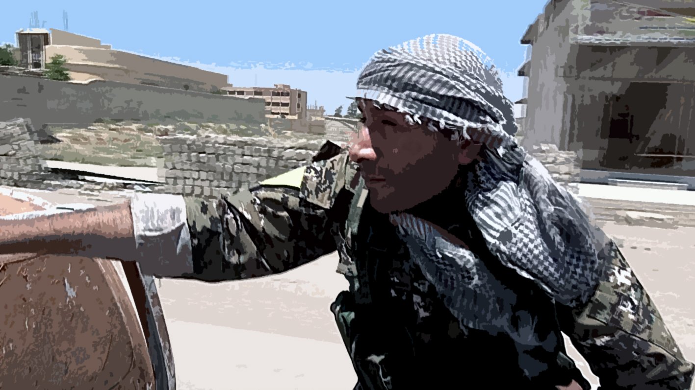 The image shows a soldier or combatant wearing a camouflage uniform and a traditional scarf, possibly indicating a specific cultural or regional background. The individual appears to be in an urban or semi-urban setting, with buildings and debris in the background. The person is depicted in a moment of alertness or movement, suggesting a context related to military operations or conflict. The environment looks tense and potentially dangerous.