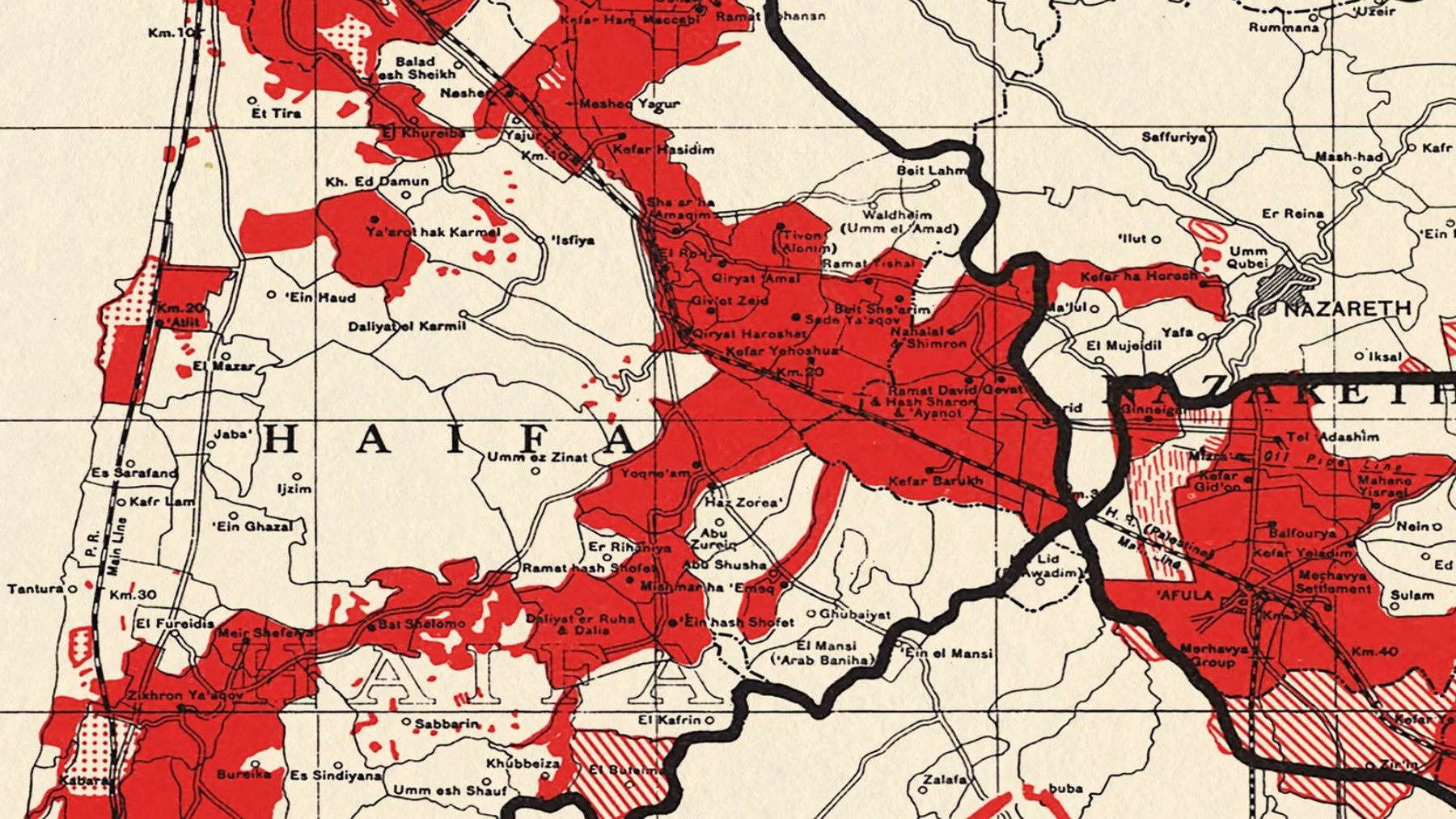 L'image représente une carte dans des tons rouges et blancs, probablement montrant des zones géographiques ou des limites administratives. On peut y voir des noms de localités, des routes et des frontières qui semblent délimiter différentes régions. Les zones rouges peuvent indiquer des zones d'intérêt particulier, de densité de population, ou une autre forme de classification. L'ensemble de la carte dégage un aspect historique ou thématique lié à la région représentée, qui semble être située en Israël, en particulier autour de Haïfa.