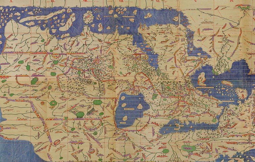L'image représente une ancienne carte du monde, probablement une réplique ou une adaptation d'une carte de Ptolémée. On y voit diverses régions et méridiens dessinés, avec des indications géographiques comme des rivières, des montagnes et des villes, souvent en utilisant des symboles colorés. La carte est ornée de détails artistiques et de textes en latin ou en grec, faisant ressortir les connaissances géographiques de l'époque. La mer est représentée en bleu et des éléments naturels sont affichés, permettant une visualisation des paysages environnants.