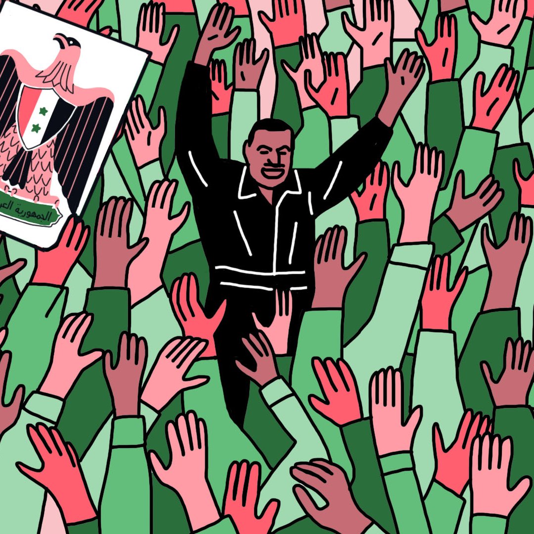 L'image montre une grande foule de mains levées, qui semblent exprimer une sorte d'enthousiasme ou d'approbation. Au centre, un homme en tenue noire est visible, se tenant debout parmi la foule. À sa gauche, il y a un drapeau portant un aigle, symbole souvent associé à des gouvernements ou mouvements nationalistes. L'ensemble de la scène donne une impression de rassemblement politique ou de manifestation, suggérant une atmosphère de soutien ou de célébration collective. Les couleurs vives, notamment le vert et le rouge, ajoutent une dimension dynamique à l'image.