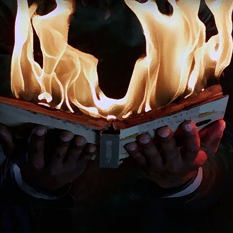 L'image montre un livre ouvert qui est en flammes. Les pages sont consumées par le feu, créant une impression intense et dramatique. Les mains qui tiennent le livre sont visibles, et l'arrière-plan est sombre, ce qui fait ressortir le contraste avec les flammes vives. Cette scène pourrait évoquer des thèmes de destruction, de passion ou de la lutte contre des idées.