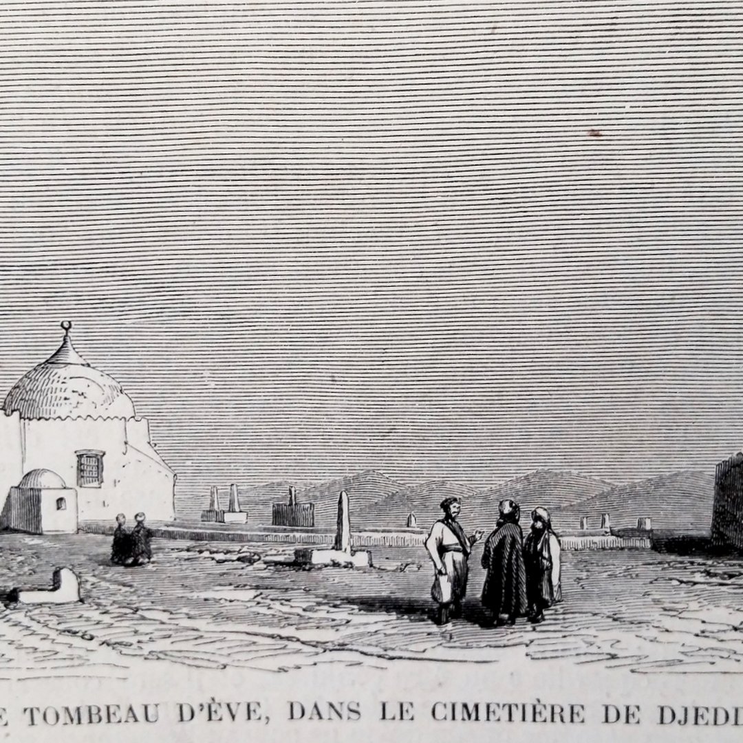 The image depicts a grave site, specifically the Tomb of Eve, in the cemetery of Djeddah (Jeddah). It shows a domed structure that likely marks the tomb, surrounded by a barren landscape. In the foreground, a small group of people is gathered, dressed in traditional attire. The scene is set against a backdrop that suggests a historical or cultural significance, with additional structures or ruins visible in the distance. The overall atmosphere conveys a sense of reverence and history.