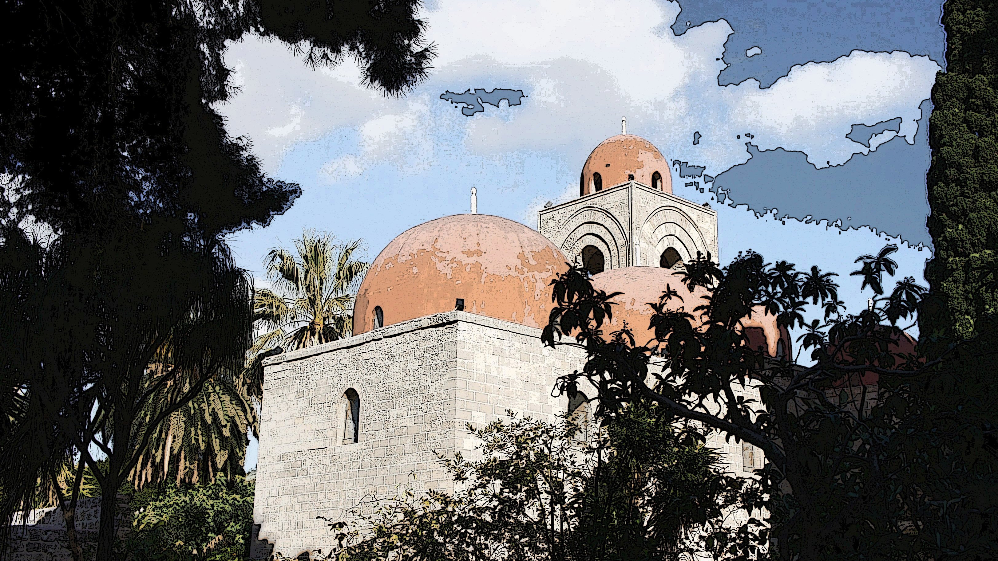 L'immagine mostra un edificio caratterizzato da varie cupole di colore rosso, circondato da alberi e vegetazione. Il cielo è blu con nuvole leggere. La struttura sembra avere un aspetto storico, con mura in pietra e dettagli architettonici che richiamano uno stile tradizionale. La scena trasmette una sensazione di serenità e bellezza naturale, tipica di luoghi di interesse culturale o religioso.