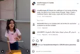 Une petite fille souriante devant une salade traditionnelle.