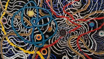 The image features a vibrant abstract design with intertwining lines and shapes. It includes a variety of colors, such as blue, red, yellow, and white, creating a dynamic and complex pattern. The background is dark, which enhances the brightness of the interwoven elements. Circular forms are scattered throughout, contributing to the overall sense of movement and depth, resembling a blend of organic and geometric motifs. The texture suggests a tactile quality, inviting viewers to explore the intricate connections within the composition.