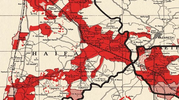 L'image représente une carte dans des tons rouges et blancs, probablement montrant des zones géographiques ou des limites administratives. On peut y voir des noms de localités, des routes et des frontières qui semblent délimiter différentes régions. Les zones rouges peuvent indiquer des zones d'intérêt particulier, de densité de population, ou une autre forme de classification. L'ensemble de la carte dégage un aspect historique ou thématique lié à la région représentée, qui semble être située en Israël, en particulier autour de Haïfa.